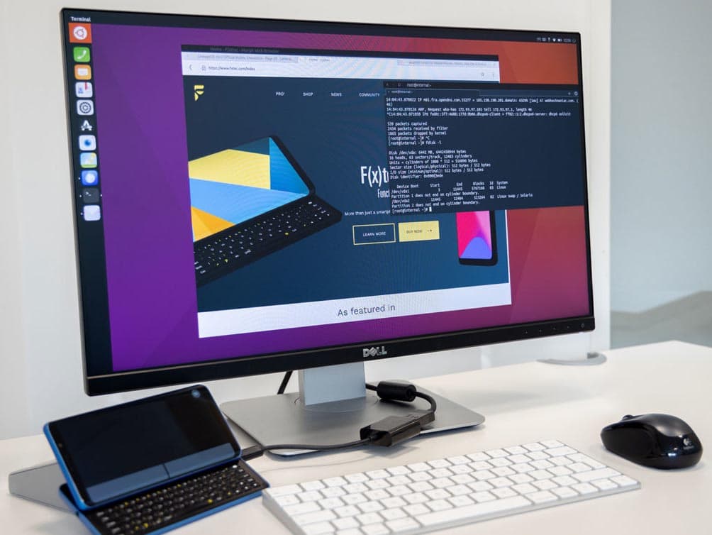Illustration du F (x) tec Pro1-X exécutant Ubuntu Touch et avec son interface Linux lorsqu'il est connecté à un ordinateur personnel.
